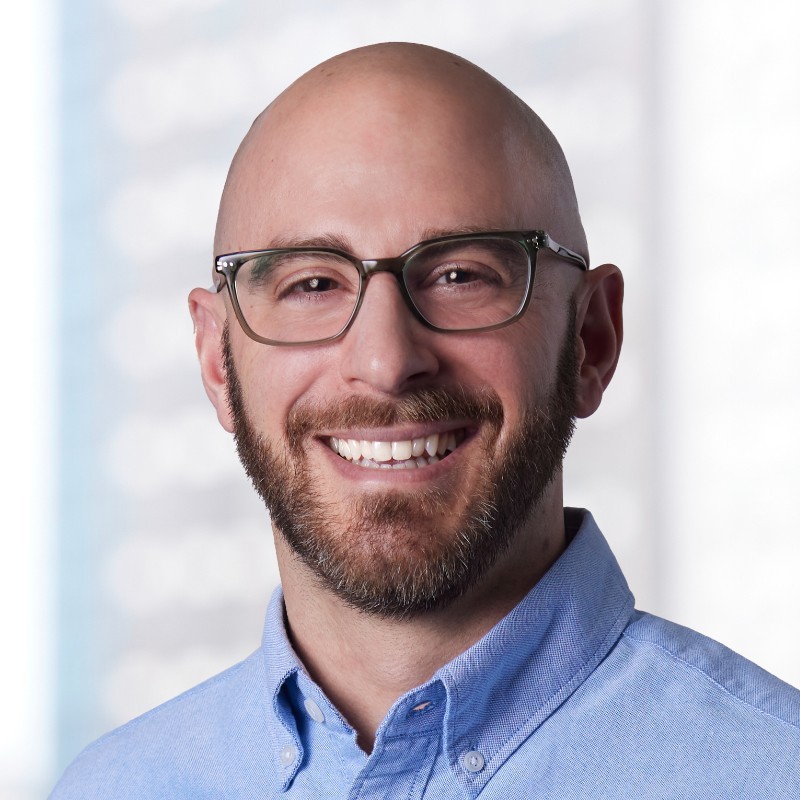 Greg DiTullio, Chief Executive Officer at Rival seen posing for a photo with a bright smile on his face
